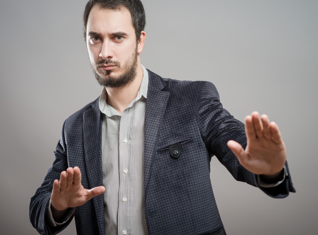 Man showing stop gesture