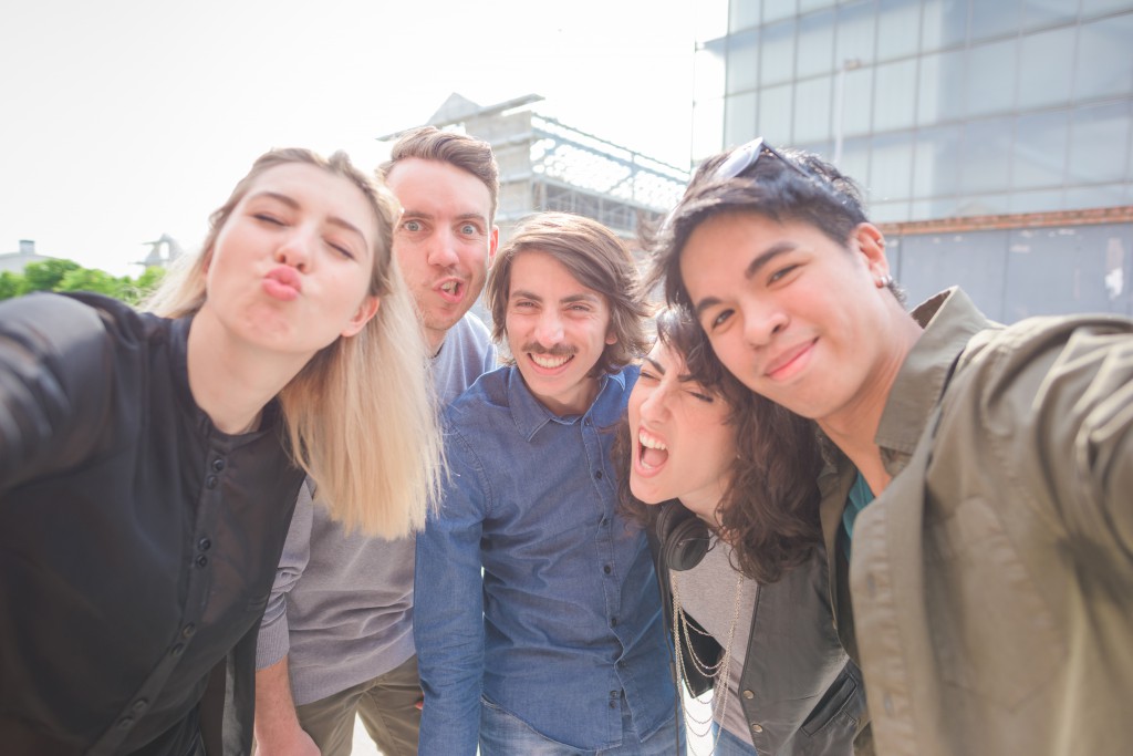 Group of young multiethnic friends having fun